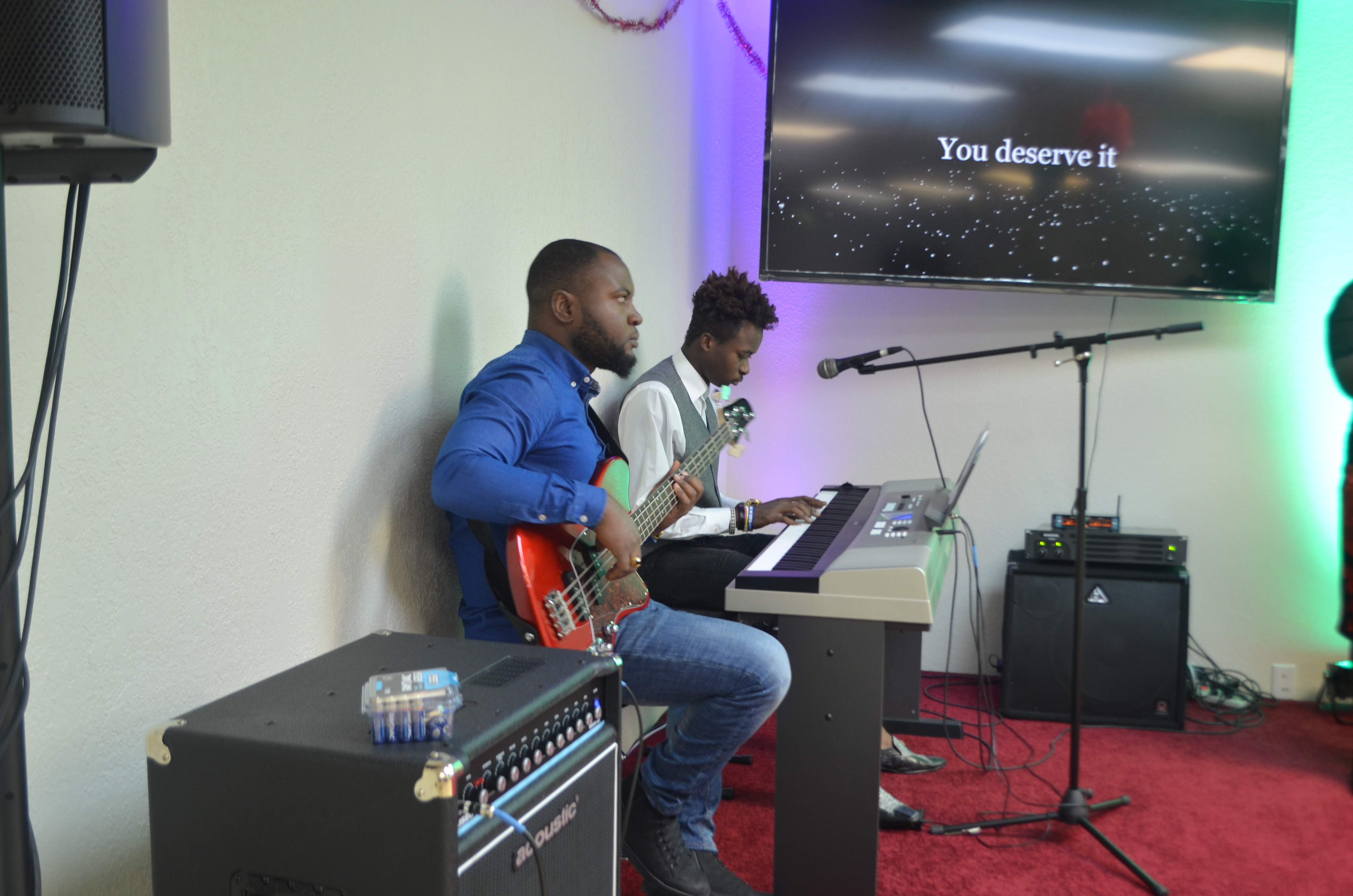 boys playing musical instrument